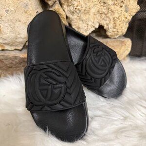 Black Rubber Slide Sandals With Embossed Design